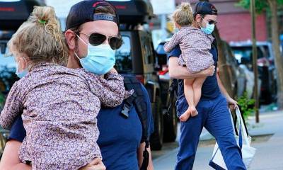Irina Shayk - Bradley Cooper carries daughter on in New York City outing - dailymail.co.uk - city New York