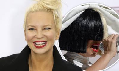 Sia gushes about being 'in heaven' as a mother after adopting two boys aging out of foster care - dailymail.co.uk - Australia