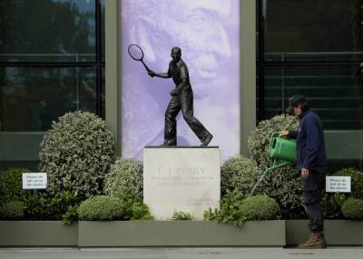 Serena Williams - Roger Federer - 11 o'clock and all's silent on Wimbledon's would-be Day 1 - clickorlando.com