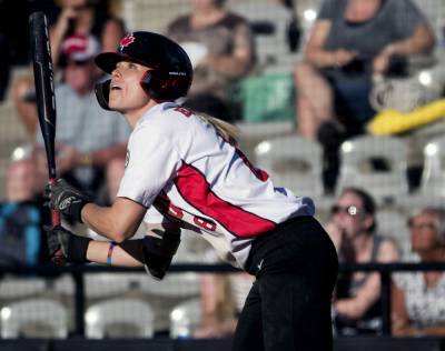 Summer Games - New league attracts softball's best, gives power to players - clickorlando.com - Japan - Canada - city Chicago