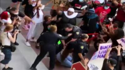White Florida officer charged in shoving of Black woman - clickorlando.com - state Florida - county Broward - county White - county Lauderdale - city Fort Lauderdale, state Florida