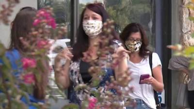 Florida governor resists ordering masks as hospitals fill up amid COVID-19 pandemic - clickorlando.com - state Florida - city Tallahassee, state Florida