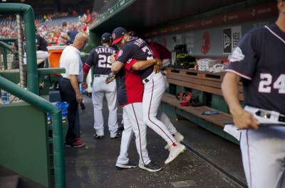 Dave Martinez - No high-fives? No spitting? MLBers adjust in COVID world - clickorlando.com - Washington - city Chicago