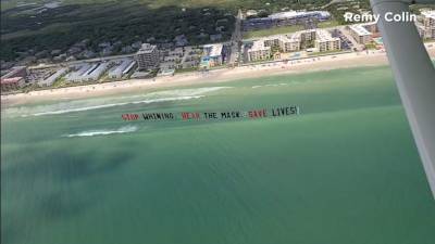 ‘Stop whining, wear the mask, save lives’ banner flies over Central Florida - clickorlando.com - New York - Switzerland - state Florida