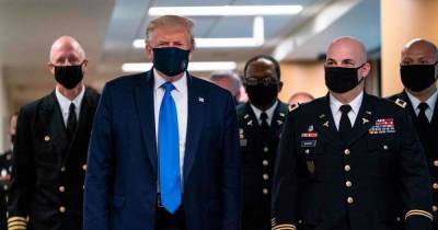 Donald Trump - Trump wears face mask for first time in public after saying Covid-19 'would disappear' - mirror.co.uk - Usa - state Maryland