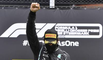 Lewis Hamilton - John Carlos - Tommie Smith - F1 star Hamilton raises right fist in fight against racism - clickorlando.com - Usa - Austria - city Mexico City