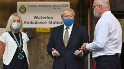 Boris Johnson - U.K.Prime - Coronavirus: UK PM Boris Johnson says people should wear masks in shops - globalnews.ca - Britain