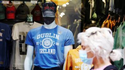 Stephen Donnelly - Concern over shops 'policing' non-mandatory wearing of face masks - rte.ie - Ireland