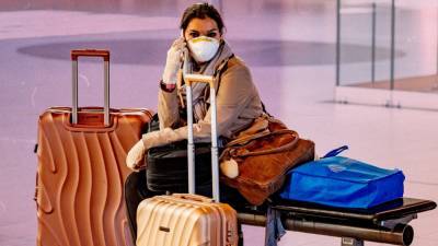 Flying During Coronavirus? 20 Items to Bring For Safe Flights - glamour.com