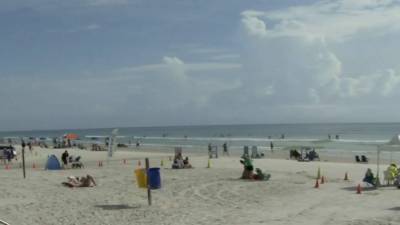New Smyrna Beach mayor wants beaches to be limited to essential activities only - clickorlando.com - county Volusia