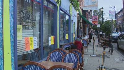 People enjoy time on South Street while attempting to practice social distancing, safety precautions - fox29.com