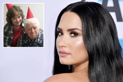 Demi Lovato mourns death of beloved grandfather and says it ‘hurts’ to not hold funeral in pandemic - thesun.co.uk