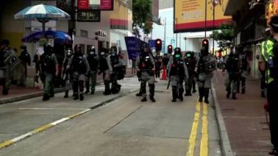 Hong Kong police make first arrests under new security law as thousands protest - globalnews.ca - China - Hong Kong - city Hong Kong