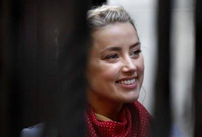 Johnny Depp - Amber Heard - Amber Heard begins 2nd day of testimony in Depp libel trial - clickorlando.com - Britain - city London