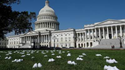 ‘We wanted the shoes to symbolize a life’: 164 pairs of clogs laid on Capitol lawn for nurses lost to COVID-19 - fox29.com - state California - area District Of Columbia - Washington, area District Of Columbia