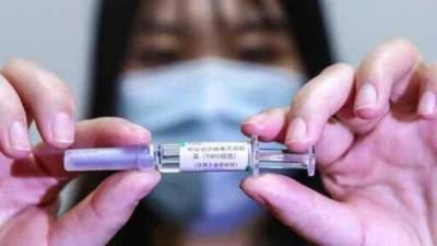 China's Sinopharm says coronavirus vaccine could be ready by year-end - livemint.com - China - city Beijing