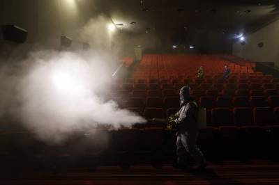 Beijing partly reopens movie theaters as virus declines - clickorlando.com - China - city Beijing - city Jilin - region Xinjiang