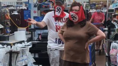Couple banned by Walmart after wearing Nazi flag face masks at Marshall, Minnesota store - fox29.com - state Minnesota - county Marshall