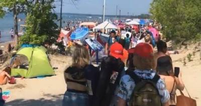 Video shows crowds gathering in Wasaga Beach, Ont., on Canada Day: ‘It was just crazy’ - globalnews.ca - Canada