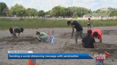 Coronavirus: Sand sculptures at Toronto beach illustrate socially distant summer safety - globalnews.ca