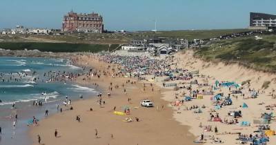 Brits pack out UK beaches in heatwave - as coronavirus cases soar in Cornwall - mirror.co.uk - Spain - Britain