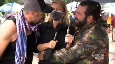 TVA reporter presses charges following anti-mask protest - globalnews.ca