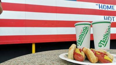 Hot dog champs repeat as July 4 eating contest moves indoors - fox29.com - city Brooklyn
