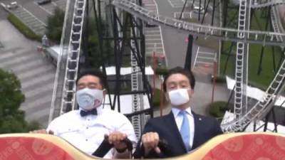 Japanese theme park execs demonstrate how to ride a rollercoaster without screaming - globalnews.ca - Japan