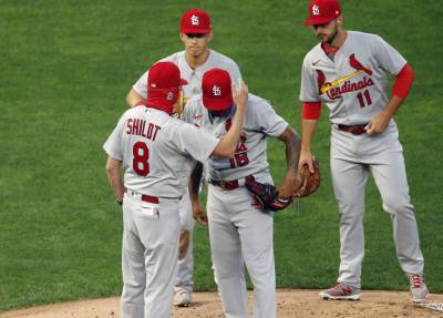 AP source: Cards-Brewers off; 4 more St. Louis positives - clickorlando.com - county St. Louis - city Milwaukee