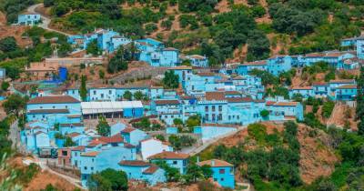 Spain's real-life blue Smurf village bans swimming to halt coronavirus - mirror.co.uk - Spain - city Andalusia