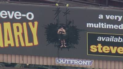 LAFD responds to unusual call for service after man tapes himself to billboard in publicity stunt - fox29.com - Los Angeles - city Hollywood