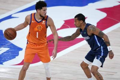 Devin Booker - Luka Doncic - Suns top Mavs to keep playoff hopes alive, go 8-0 in bubble - clickorlando.com - Los Angeles - state Florida - county Lake - county Buena Vista - city Portland - county Dallas - county Maverick