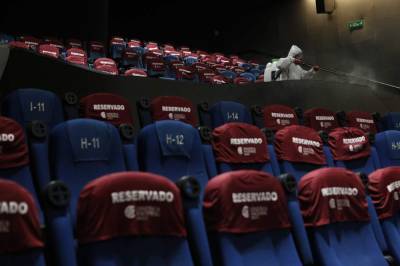 Mexico City reopens movie theaters to sparse crowds - clickorlando.com - city Mexico City