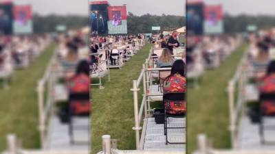 Sam Fender - Attendees sit on own platforms at socially distanced outdoor concert held in UK amid pandemic - fox29.com - Britain - county Park