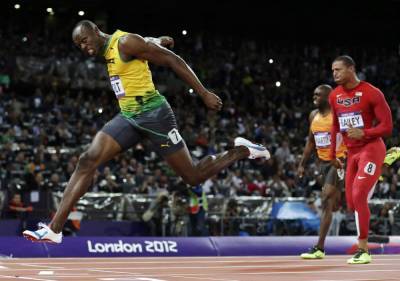 Summer Games - AP WAS THERE: 2012 London Olympics - Bolt defends 100 gold - clickorlando.com - city Tokyo