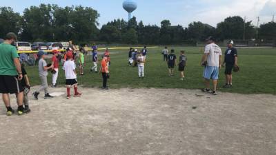 Field of dreams: Volunteers keep baseball going in this community after COVID-19 cancels league play - clickorlando.com - state Michigan - county Oxford