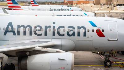 Alex Tai - Brawl breaks out on American Airlines plane when passenger refuses to follow face-covering policy - fox29.com - Usa - city Las Vegas