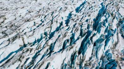 Greenland lost 586 billion tons of ice in record melt last year - fox29.com - Germany - state California - Greenland