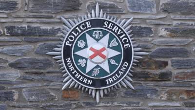 60 PSNI officers self-isolating after Covid-19 outbreak - rte.ie - Ireland - county Antrim