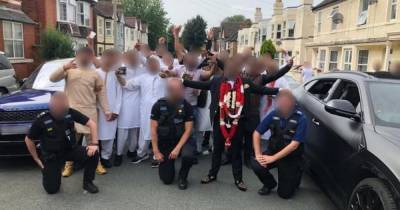 Police slammed for posing with guests at huge coronavirus rule-breaking wedding - dailystar.co.uk - city Wellington - county Midland