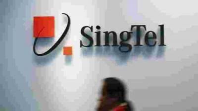 Singtel earnings fall amid COVID-19 and additional Airtel charge - livemint.com - Singapore