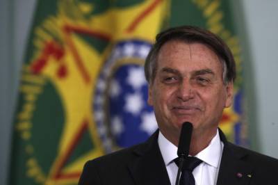 The Latest: Brazil president's son tests positive for virus - clickorlando.com - Usa - Britain - Brazil - Madison, state Wisconsin - state Wisconsin - county Johnson - Venezuela