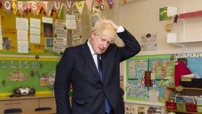 Boris Johnson - British govt U-turn as masks to be worn in schools - rte.ie - Britain - Scotland