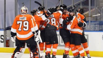 Carter Hart - Mark Blinch - Myers scores early in OT, Flyers even series with Islanders - fox29.com - New York