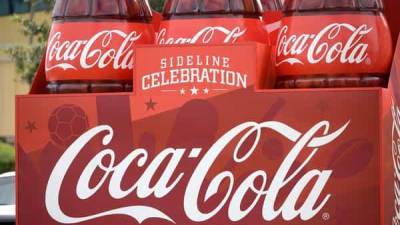 COVID-19 impact: Coca-Cola to restructure workforce, cut jobs - livemint.com - Usa - India - Canada - Puerto Rico