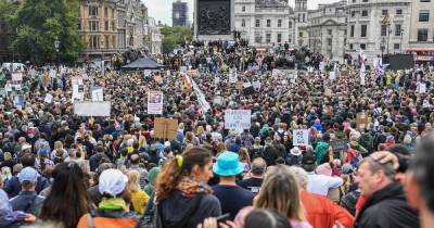 Anti-lockdown protesters gather in London calling coronavirus a 'hoax' - dailyrecord.co.uk - city Berlin - city London