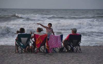 ‘Typical Florida:’ Paradise Beach visitors unfazed by Tropical Storm Isaias’ approach - clickorlando.com - state Florida - county Brevard