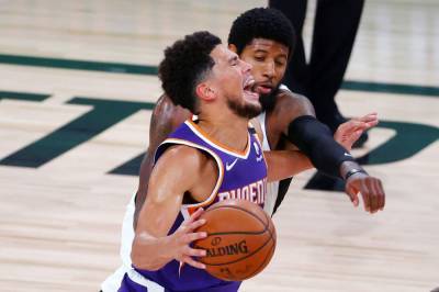 Devin Booker - Paul George - Booker's shot at buzzer leads Suns over Clippers 117-115 - clickorlando.com - Los Angeles - state Florida - county Lake - county Buena Vista