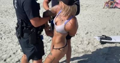 Myrtle Beach - ‘I’m not nude!’: Acrobat handcuffed after wearing thong to Myrtle Beach - globalnews.ca