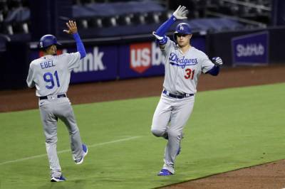 Chris Taylor - Manny Machado - Trent Grisham - Pederson homers twice to lead Dodgers over Padres, 7-6 - clickorlando.com - Los Angeles - county San Diego